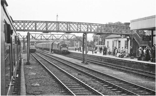 At Lincoln Central a good crowd of intending passengers awaits the approaching - photo 1