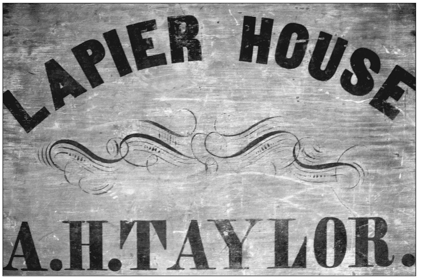 This old wooden sign hung outside early settler Anson Taylors establishment - photo 4