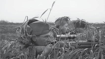 Camouflaged Russian snipers on the Eastern Front inWorld War II The Dmitri - photo 1