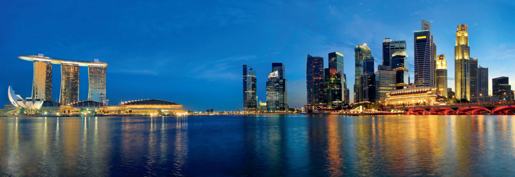 View from the Esplanade over the still waters of Marina Bay at dusk - photo 3