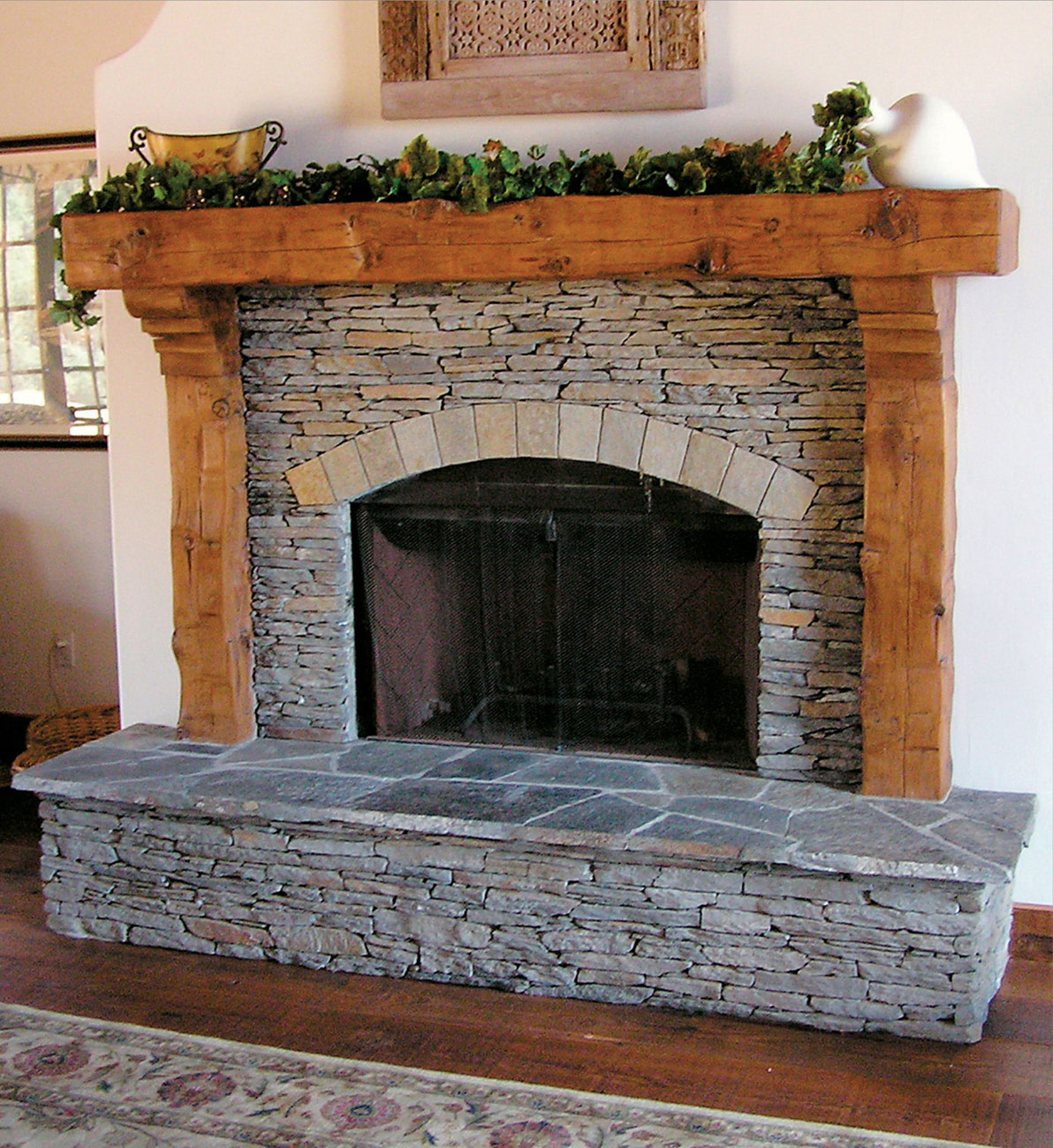 A mantelpiece made of reclaimed hand-hewn oak timbers is the perfect complement - photo 6