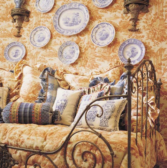 A toile from Lee Jofa wraps a room and a nineteenth-century iron daybed in - photo 4