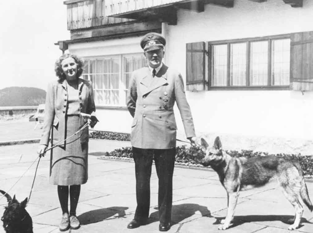 Adolf Hitler and Eva Braun at the Fhrers mountain retreat the Berghof on the - photo 4