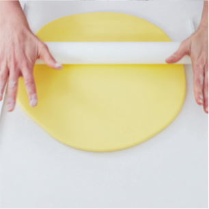 Roll out the yellow fondant on a lightly dusted worksurface to 5mm 18 in - photo 18