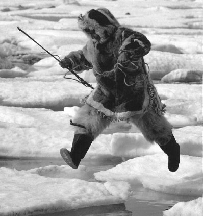 HERDS OF REINDEER move across ice and snow Slim-shouldered Lapps squatting on - photo 3