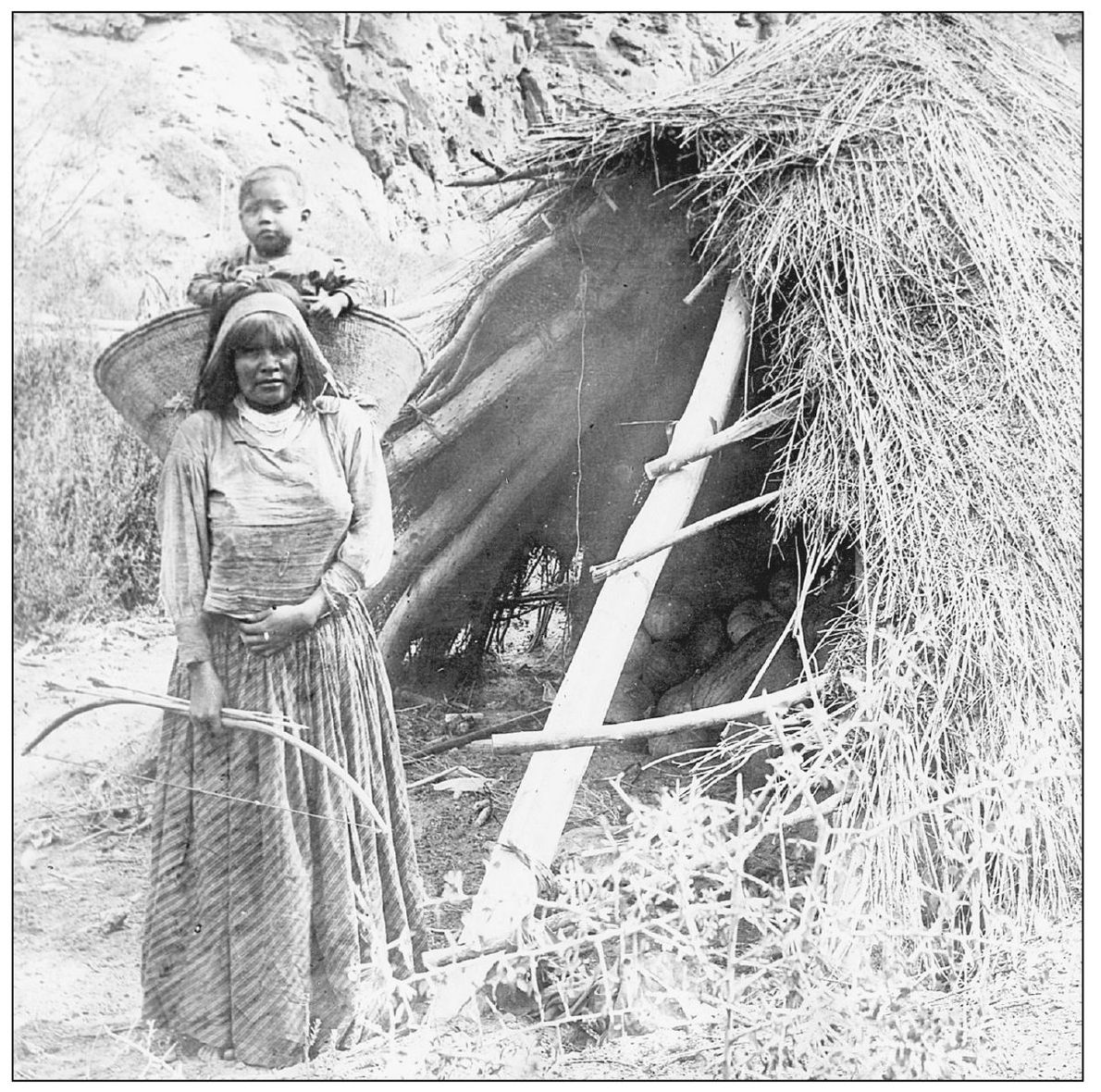 A Paiute woman is visible in this photograph taken within the Grand Canyon in - photo 3