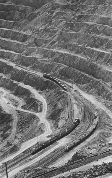 Copper mine at Ajo Helicopter spraying agricultural insecticide near - photo 11