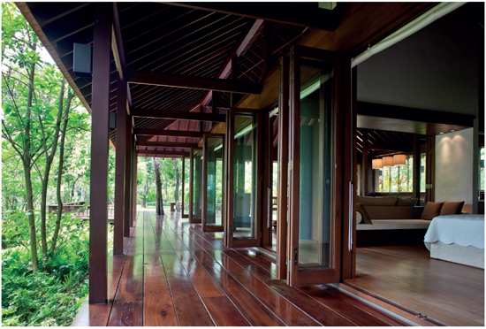 A broad teak veranda runs along the flank of the main pavilion Wide eaves - photo 5