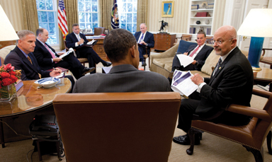 Director of National Intelligence James Clapper right briefs President Obama - photo 11