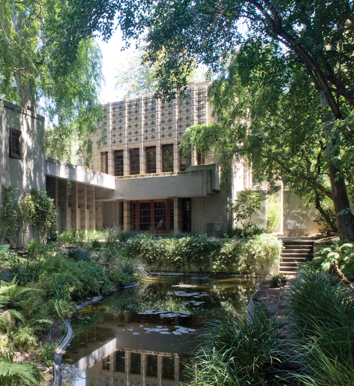 Millard House Pasadena California 192324 view from garden with guesthouse - photo 2