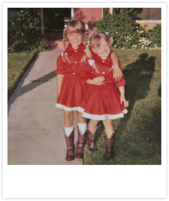 My sister Crystal and me in our cowgirl dresses getting ready to go to the - photo 4