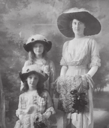 An early portrait of Enid centre with her mother Florence and younger - photo 4