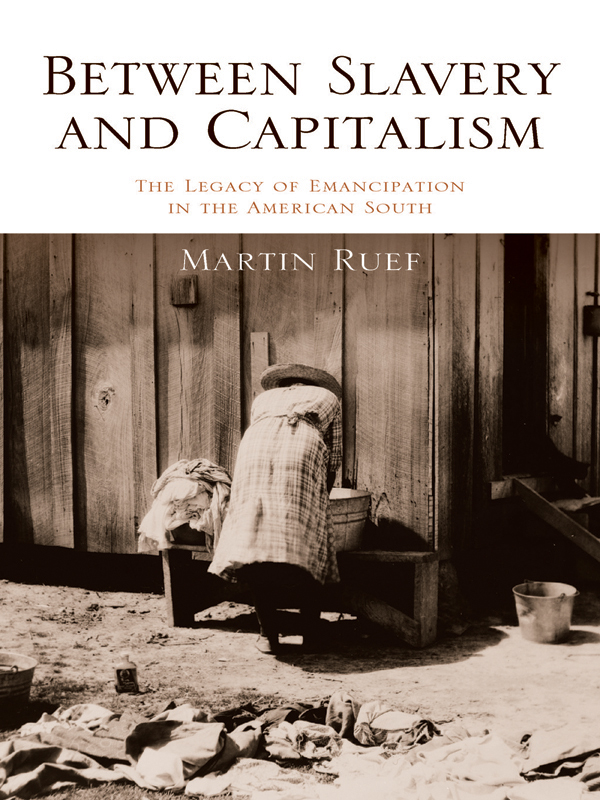 Between Slavery and Capitalism Between Slavery and Capitalism THE LEGACY OF - photo 1