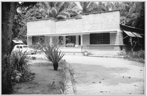 Manono 1966 A WIDE GRAVEL DRIVE leads up to a house A car stands in front - photo 4