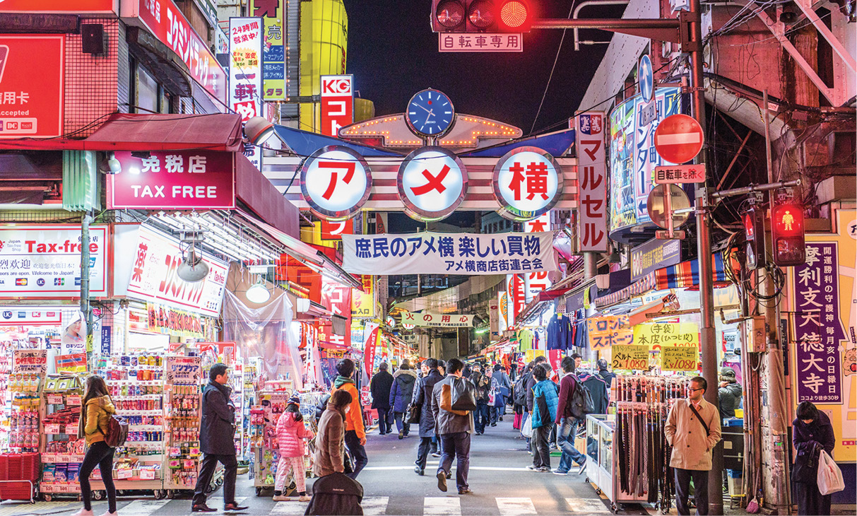 Stalls in Tokyos Ameyoko market sell everything from vegetables to handbags to - photo 17