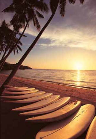 Surfboards at sunset on the northern Ilocos coast of the big island Luzon o - photo 8