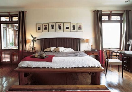 The master bedroom is designed around a floating platform bed made from three - photo 5