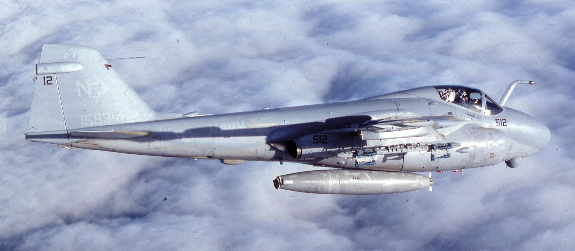 A Boomer A-6E TRAM from VA-165 sails majestically over a cloud deck near its - photo 2