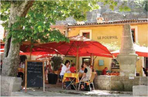 A sun-dappled caf in the Luberon Summer beach scene in Antibes - photo 5