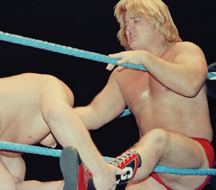 Greg Valentine in action Cowboy Bill Watts and Krusher Kruschev - photo 9