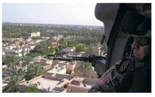 I was in Iraq in the summer on a USO tour We traveled from base to base in a - photo 6