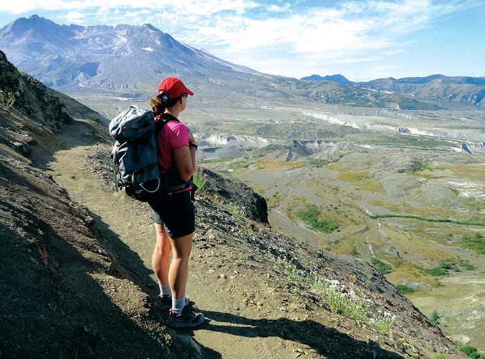 A hiker admires the Pumice Plain from the Boundary Trail on Johnston Ridge - photo 3