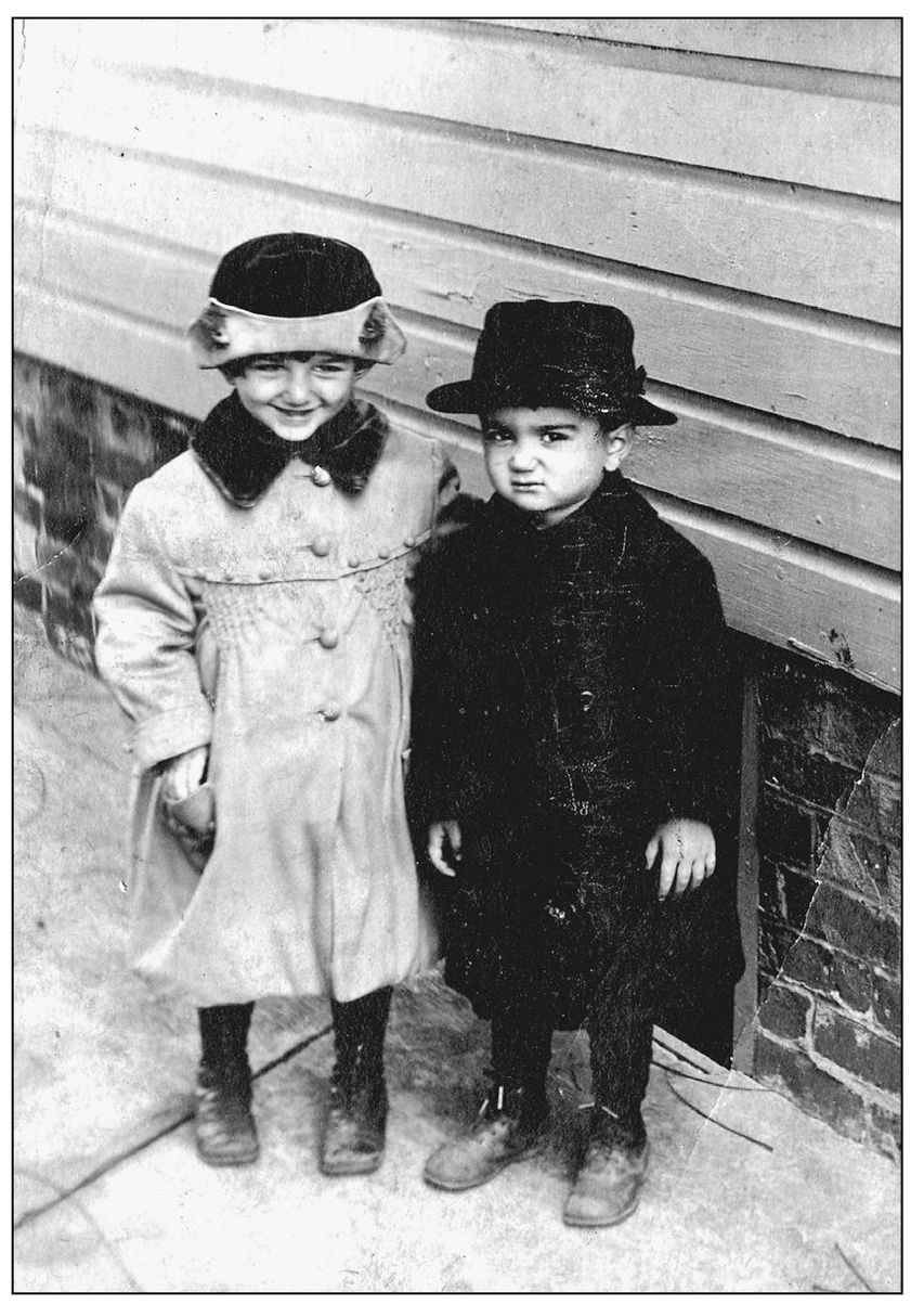 Leona Magilavy and her younger brother Jack pose in front of their Clark - photo 7