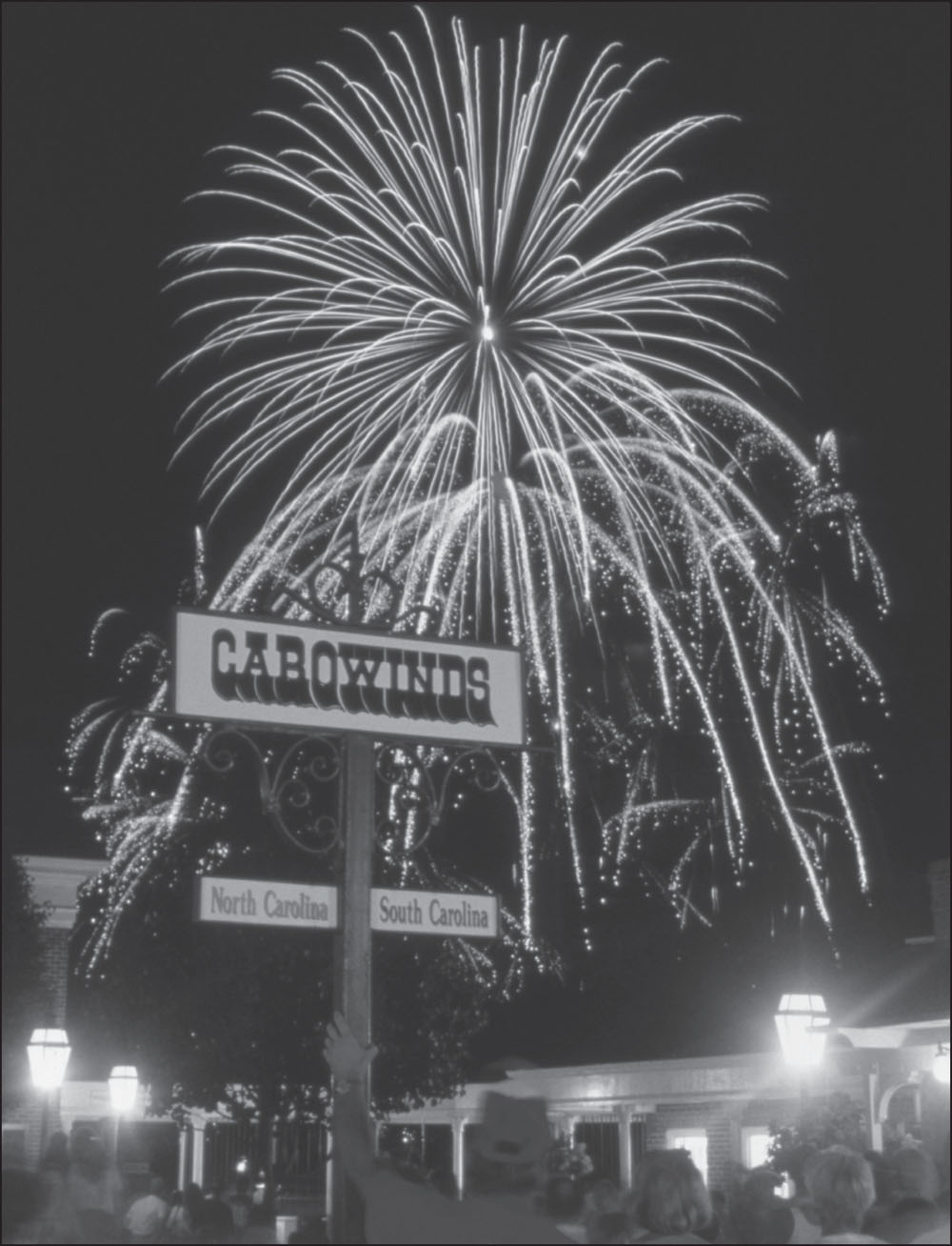Summertime fireworks bloom above the Carowinds sign that stands on the North - photo 2