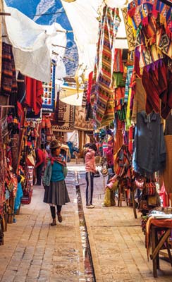 Pisac market an indigenous woman in Cusco the ruins of Machu Picchu - photo 5