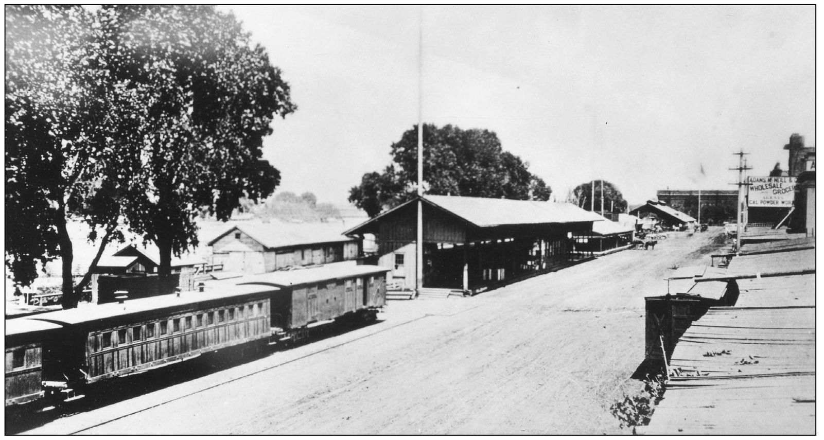 This is the scene on Front Street around 1875 Note the boxcars parked in front - photo 6