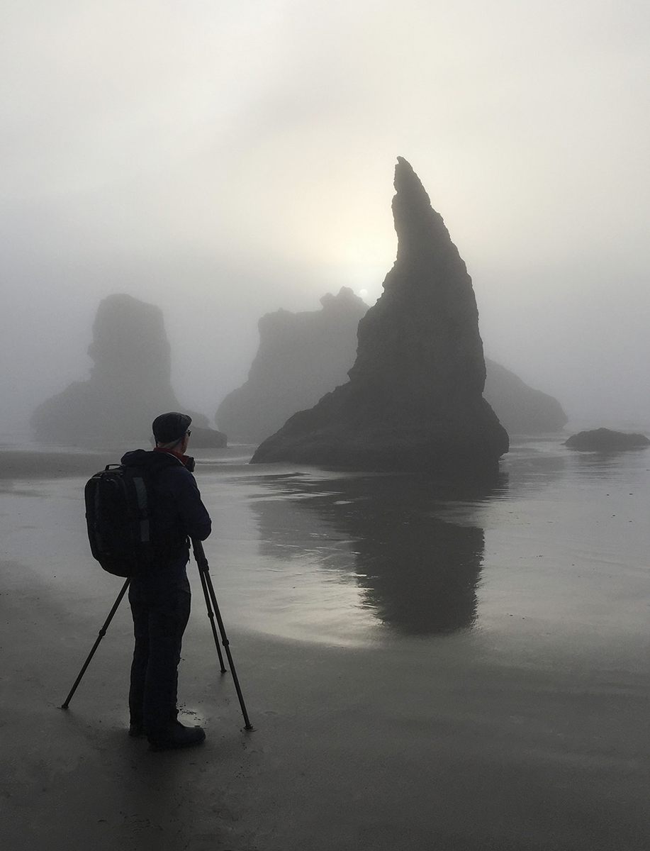 Alex Morley photographing at Howling Dog Rock Bandon Photograph by Dianne - photo 5