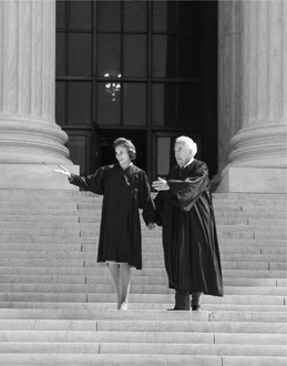 Chief Justice Warren Burger escorts Justice Sandra Day OConnor down the front - photo 4