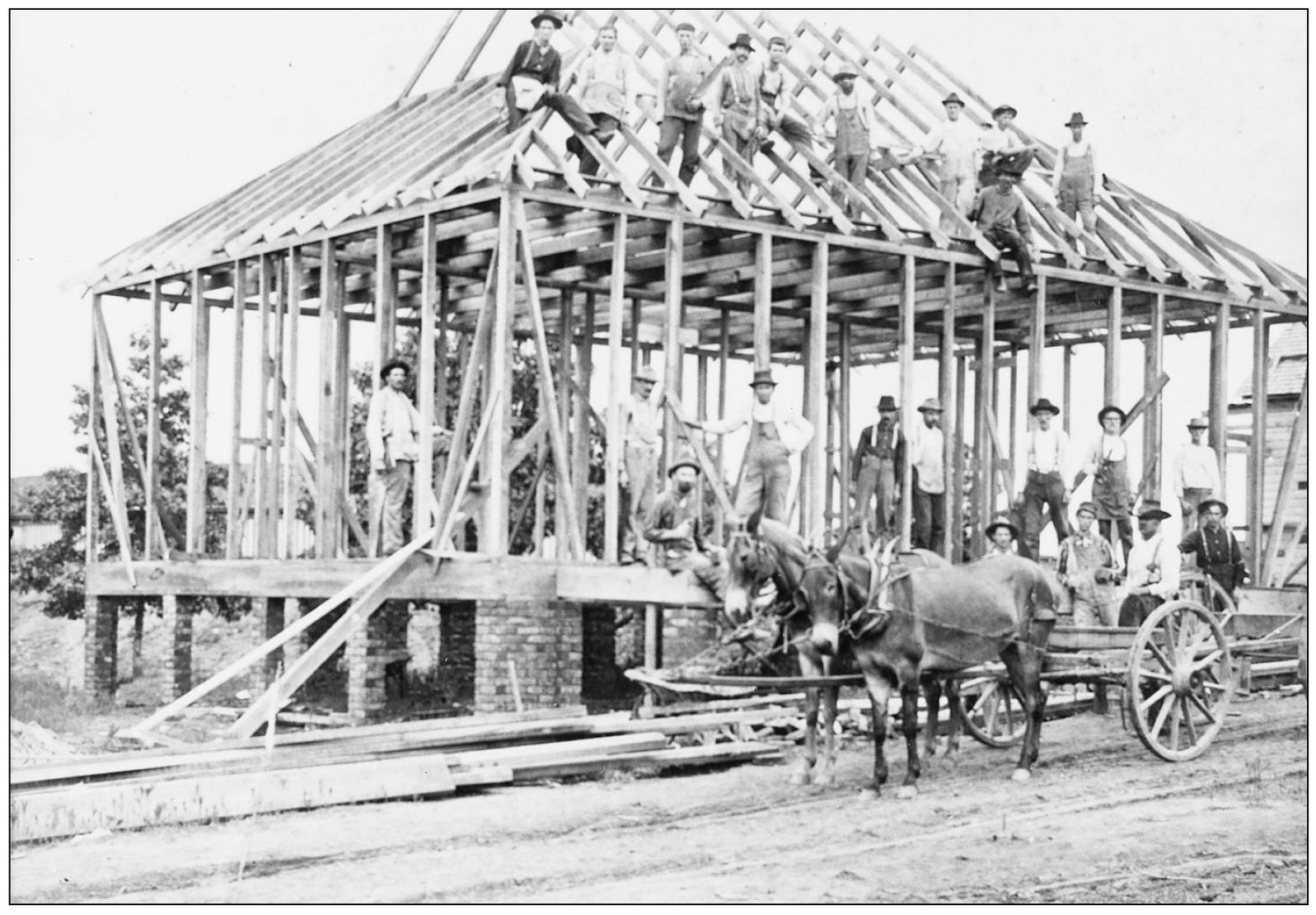 Construction on one of the many Dwight Mill Village homes is shown in this 1895 - photo 5