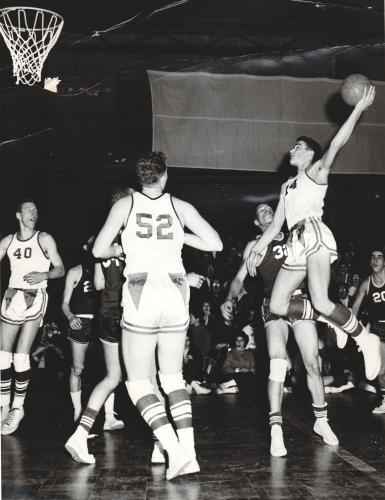 Tanenbaum shooting during a basketball game his junior year of high school He - photo 6