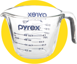 liquid measuring cup a glass or plastic measuring cup with a spout for pouring - photo 9