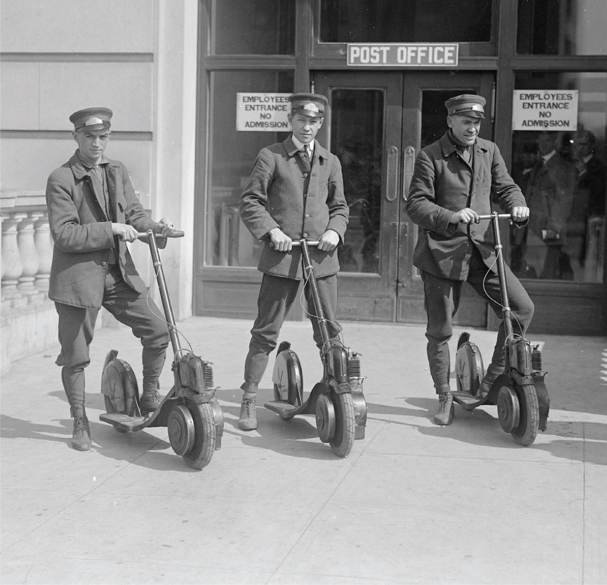 US postmen pictured here in 1917 with an early version of the scooter - photo 10