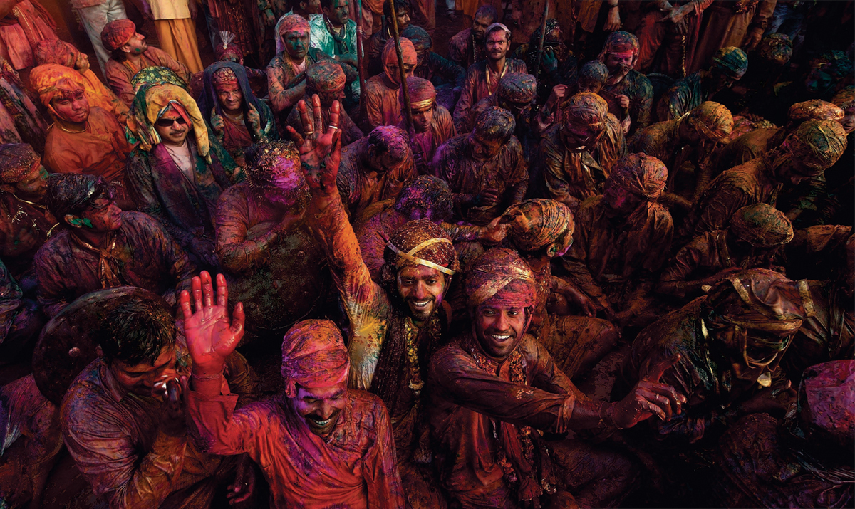 Indian villagers celebrate Holi at the Nandji Temple Manan - photo 3