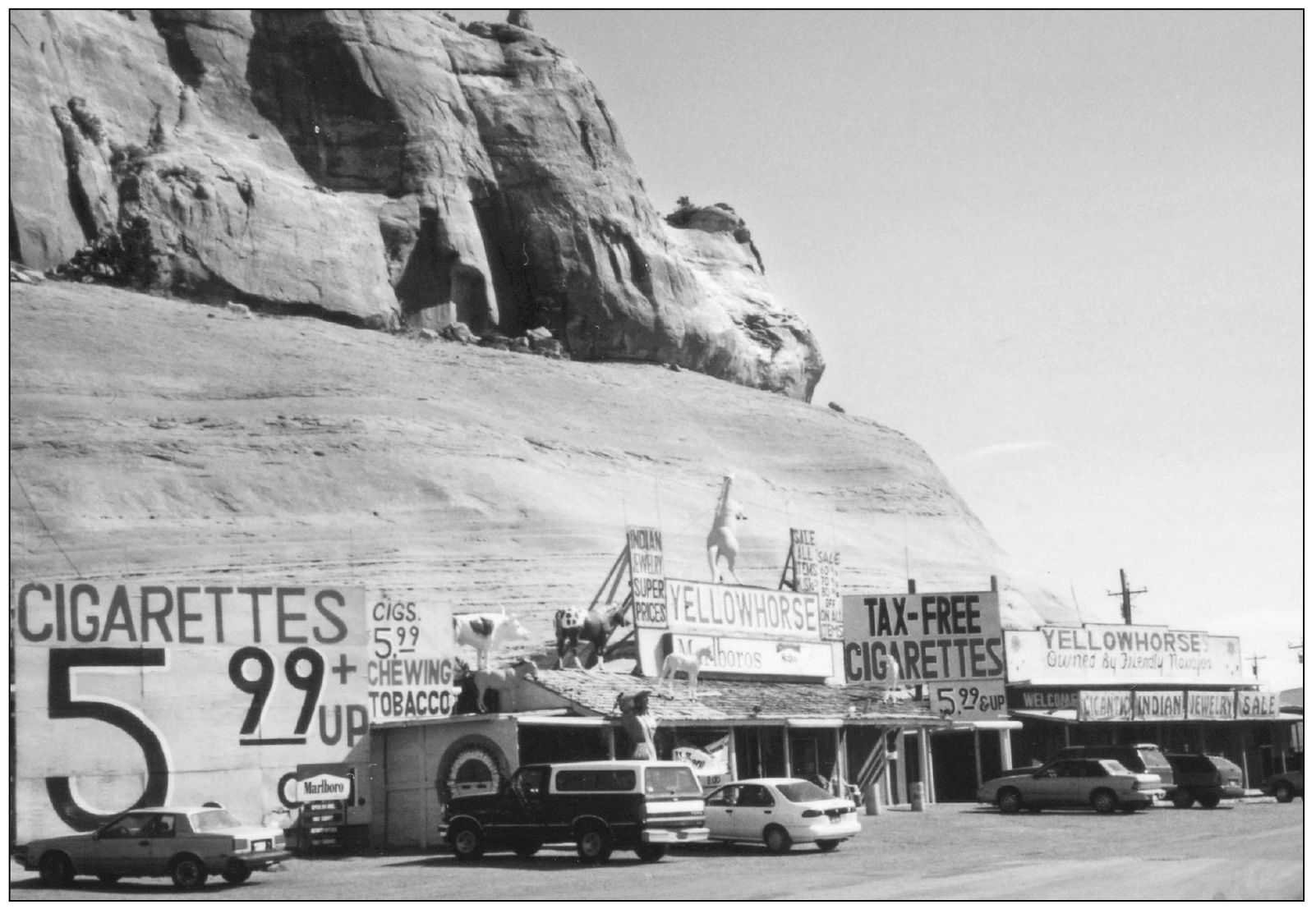 The state line runs right through the Fort Chief Yellowhorse Trading Post with - photo 4