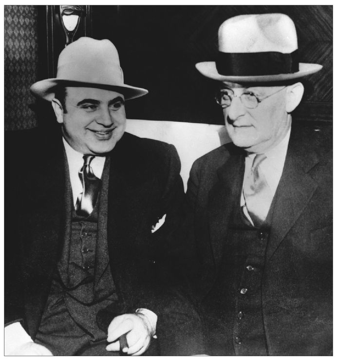 Cozying up to the law sharp-suited gangster Al Capone left with Henry - photo 7