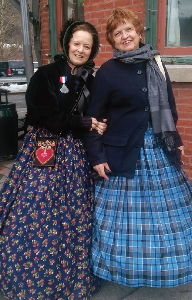 The author left and Helene Maszeroski prepare to march in a 2015 Saint - photo 1