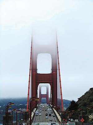 San Franciscos Golden Gate Bridge in the fog stand-up paddle boarding off - photo 9