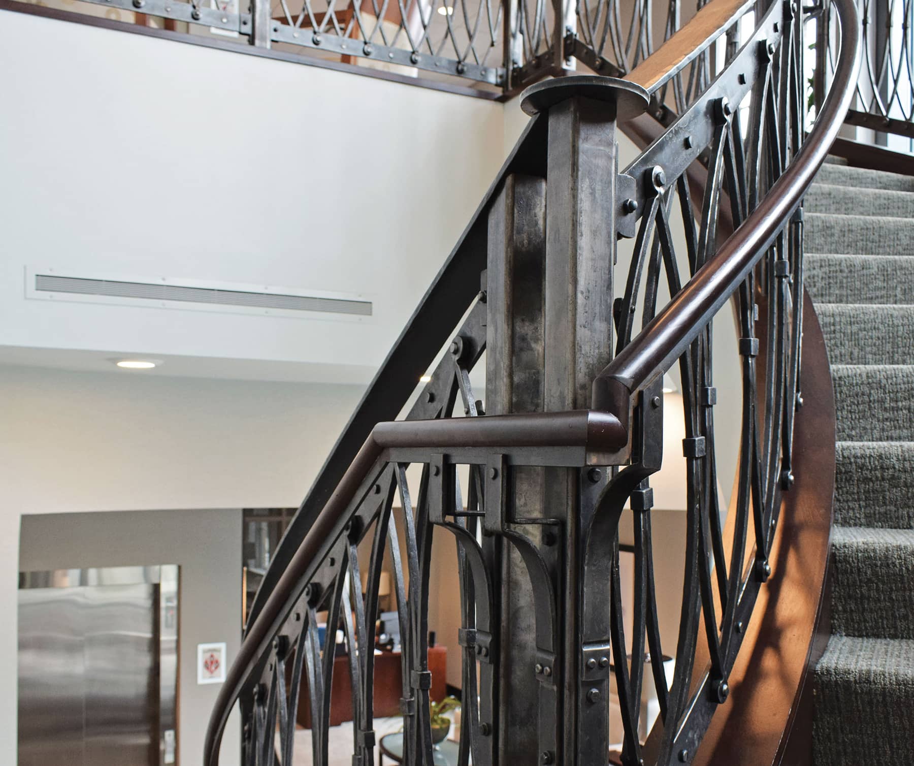 Here is a monumental staircase railing we forged for a commercial project The - photo 4