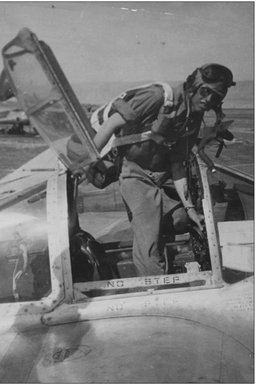 Dave climbing out of the cockpit of his P-38 Lightning at Triolo Airfield - photo 7