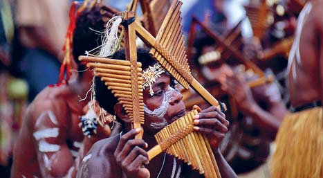 A Malaita Islander plays a traditional bamboo panpipe PETER HENDRIELONELY - photo 5