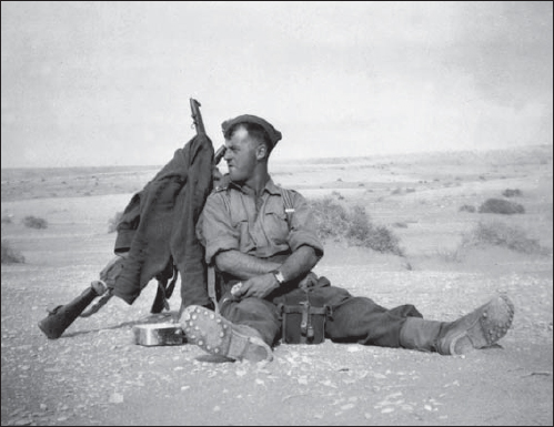 A soldier taking a break during 2nd NZ Divisions service in the Western Desert - photo 1
