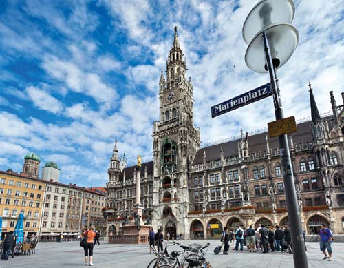 The towering New Town Hall presides over Munichs main square Marienplatz - photo 10