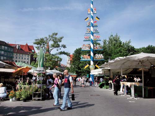 The Viktualienmarkt a fun open-air market with cheap eateries sports a - photo 11