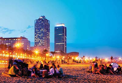 Near the busy downtown but a world away the beach at Barceloneta is a balmy - photo 16