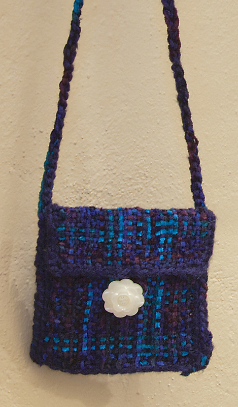 I f you are new to working with pin looms consider making a few small bags to - photo 2