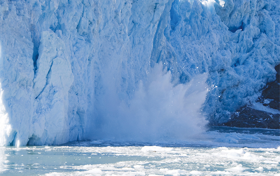 Chunks of ice break off a glacier on the southeastern coast of Greenland and - photo 3